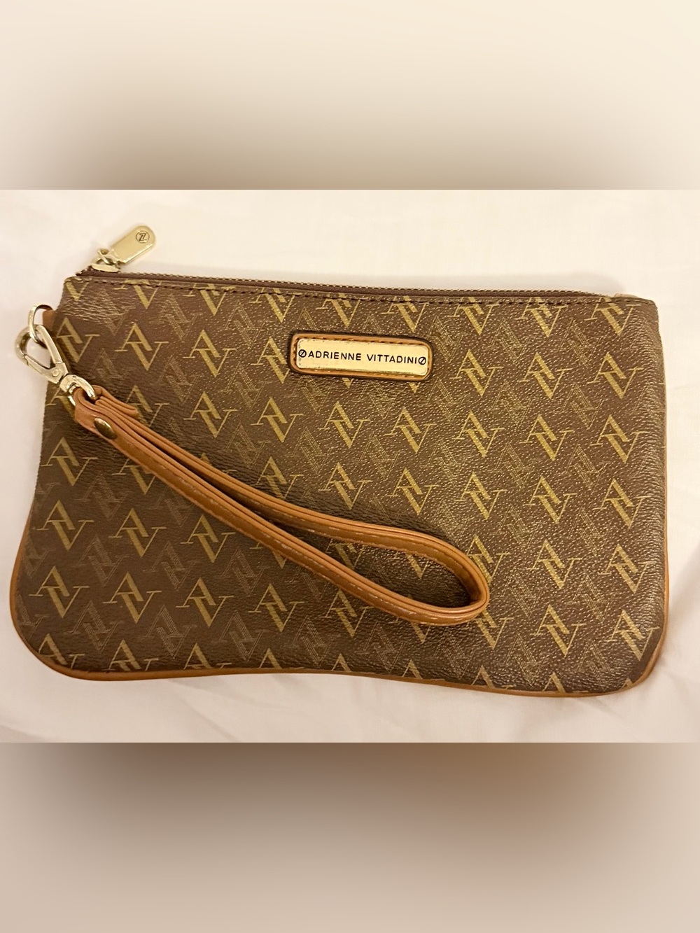 Adrienne Vittadini Brown and Tan Monogram Wristlet